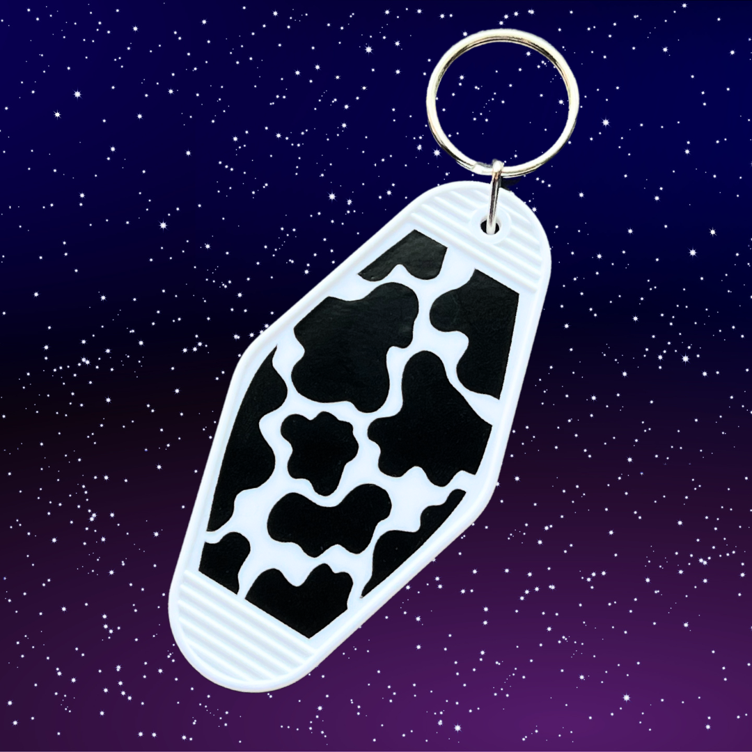 White Cow Print Motel Keychain