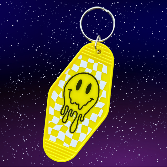 Yellow Drippy Smiley Face Motel Keychain