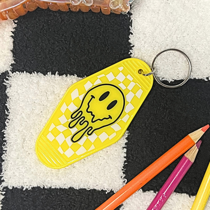 Drippy Smiley Face Motel Keychain